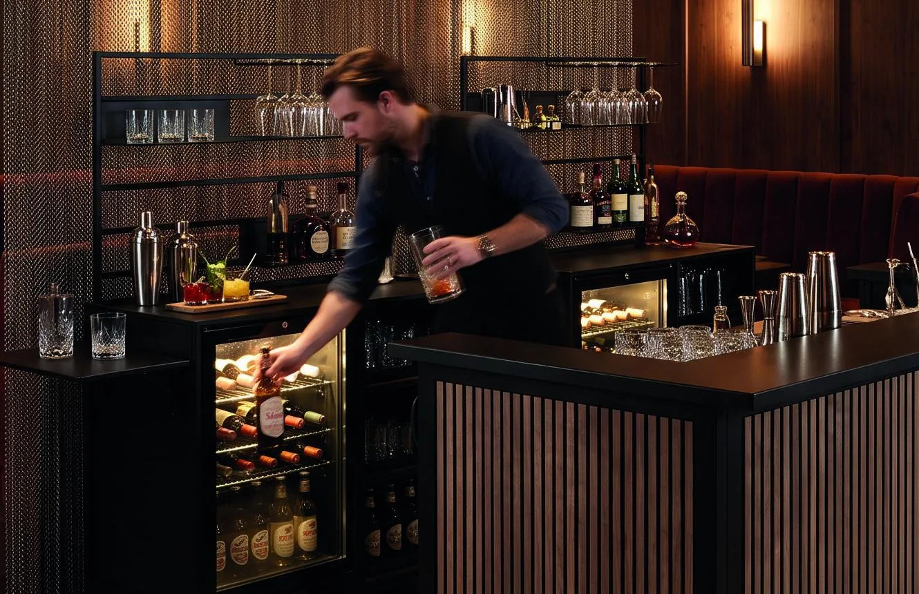 Bartender serving from a FlexBar with ribbed wood panels