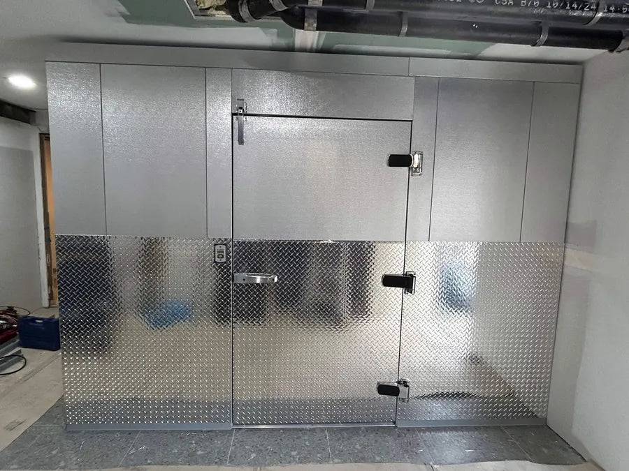 Walk-in cooler with diamond plate lower panels
