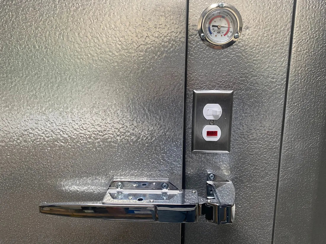 Door hardware and digital thermometer detail