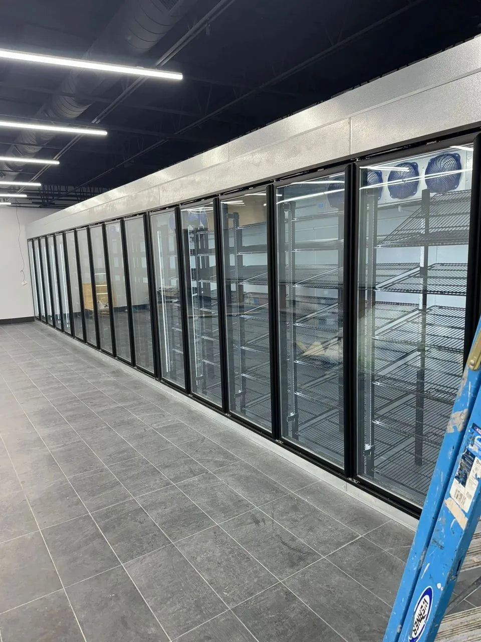 Row of glass-door beverage coolers built by King Coolers